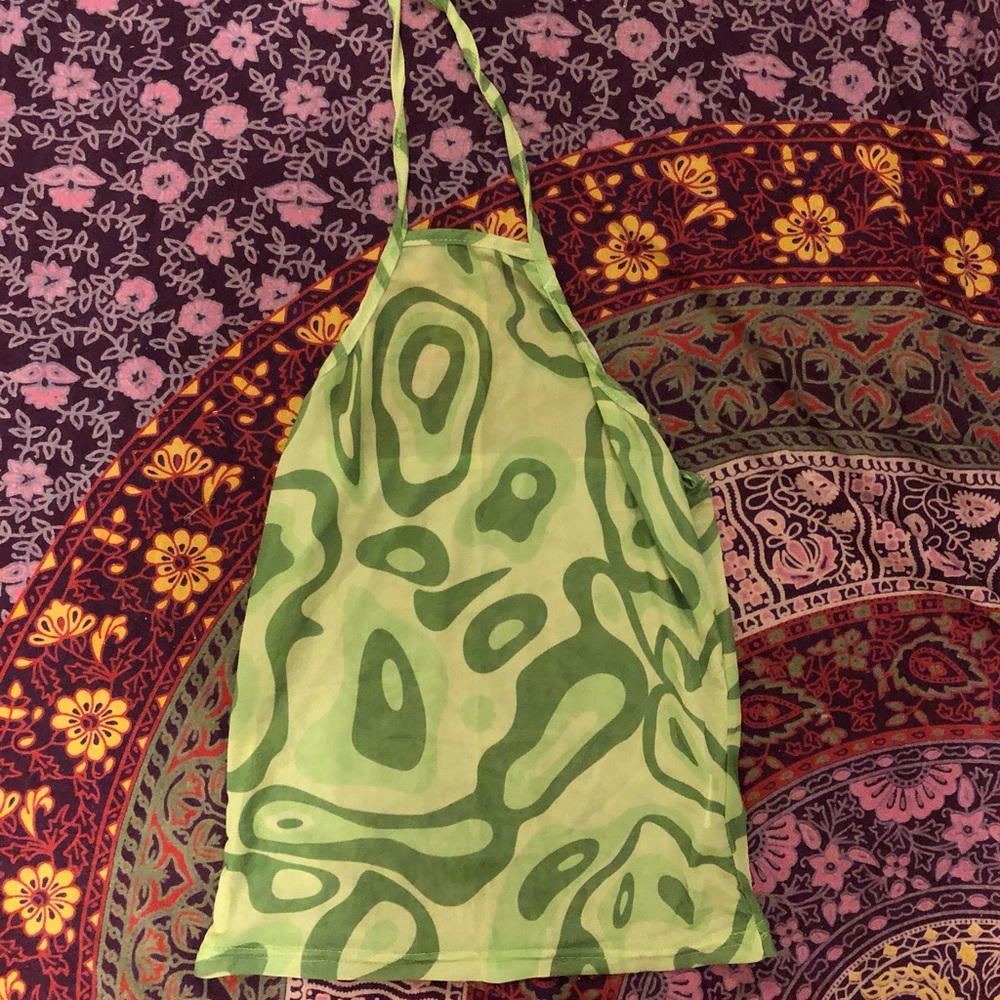 Small green swirl halter top. Sheer material